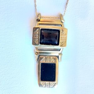 Gold tone, smoky topaz and onix necklace.